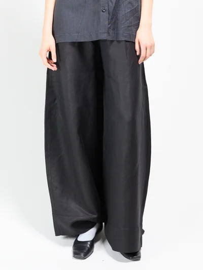 Black wide-leg trousers, front view