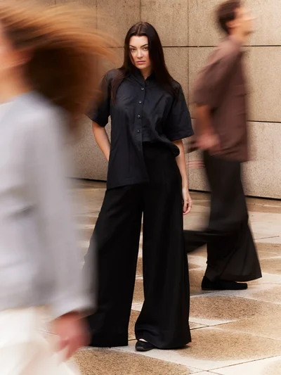 Black wide-leg trousers, detail